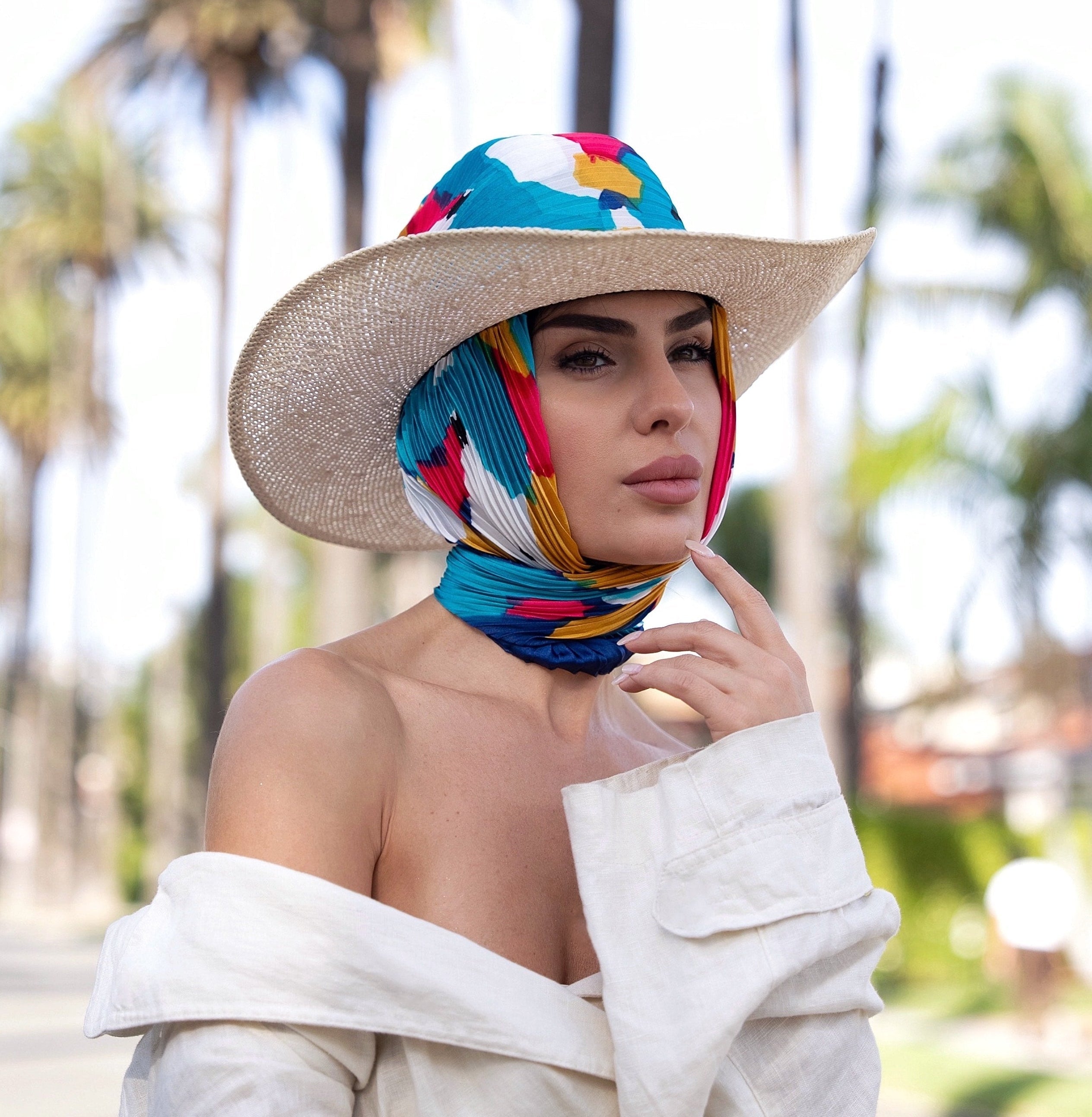 tamar tsomaia wearing palm springs scarf hat, Beverly Hills, designed in Beverly Hills to travel the world