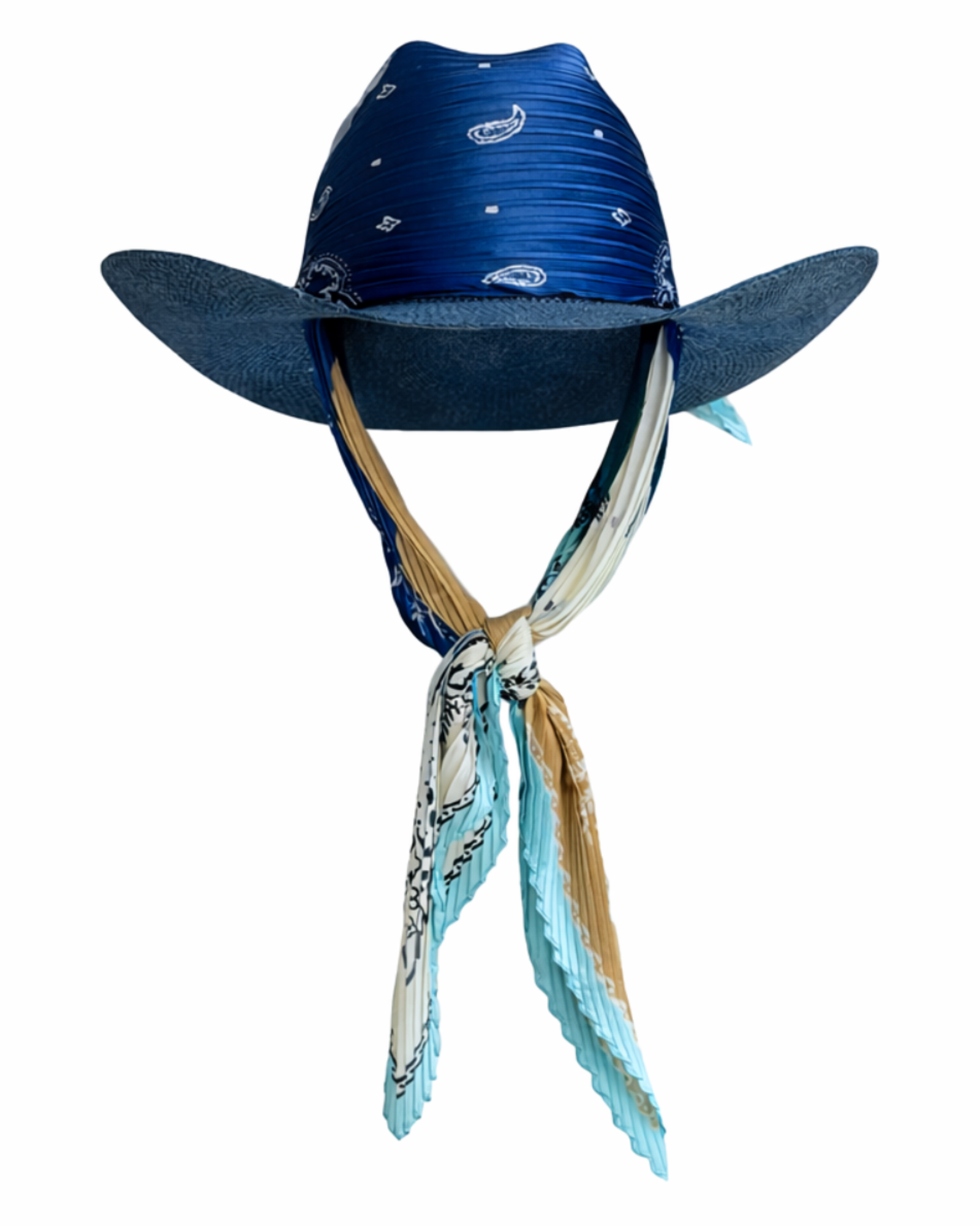 Model wearing the Texas Allure straw hat with silk scarf, combining strong structure with refined western-inspired style.